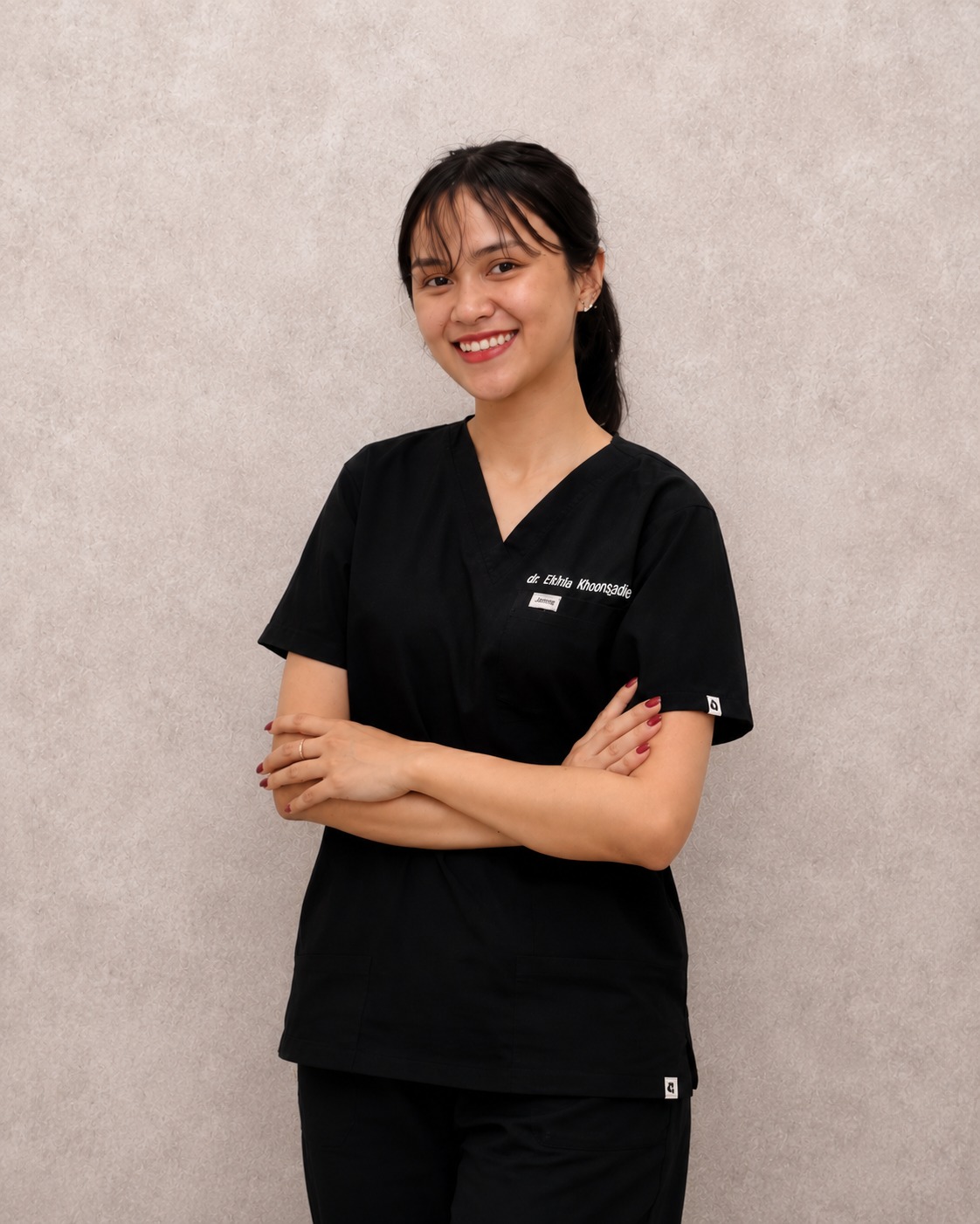 Dr. Erinia Khongdeit