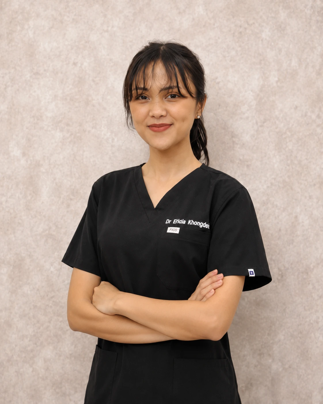 Dr. Erinia Khongdeit